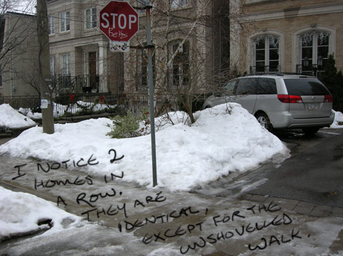 I notice three homes in a row. They are identical, except for the unshovelled walk.